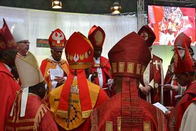 bishops gathered around Fr Carlos