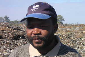 Juliao Mutemba at rubbish dump