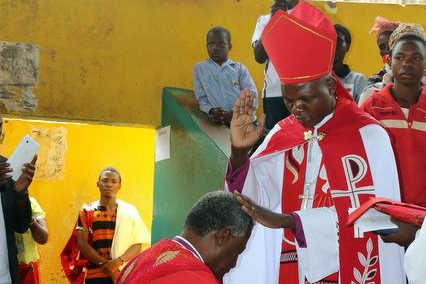 Bp Vicente blessing Archbishop Thabo